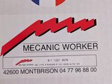a sign that says mechanic worker on the front of a box