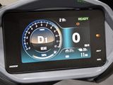 a digital display on the dashboard of a motorcycle