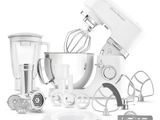 a white mixer and other kitchen appliances on a white background
