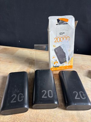 three batteries sitting next to each other on a table
