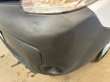 a close up of a motorcycle headlight on the front of a motorcycle