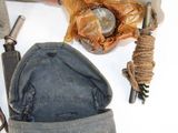 a hat that is sitting on a table with other items