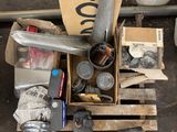 a box full of assorted items on a pallet