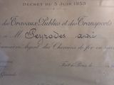 an old document with writing on it in a glass case