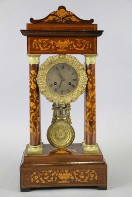 a clock that is sitting on top of a table