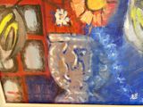 une peinture de fleurs dans un vase sur une table