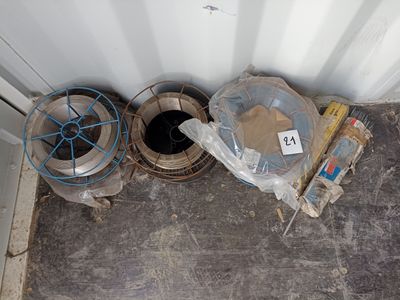 a lot of trash on the floor next to the door