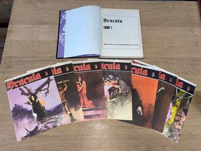 un grand nombre de livres posés sur une table