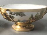 a small bowl and a smaller bowl on a table