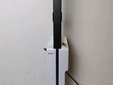 an image of a white and black floor lamp