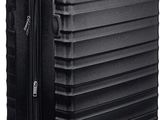 a close up of a black suitcase with wheels on a white background