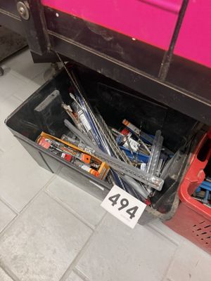 a picture of a bunch of screws in a box