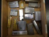 a box full of different types of lighters and lighters
