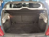 a trunk of a car with the back seats folded down