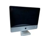 a computer monitor sitting on top of a white desk