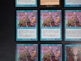 six cards of the card game are displayed on a black surface