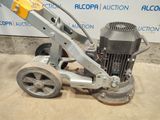 an image of a machine that is sitting on the ground