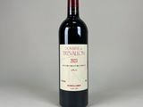a bottle of wine that is sitting on a table