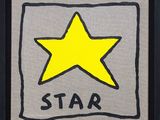 framed picture of a yellow star on a gray background