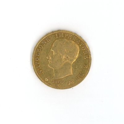 a gold coin with a picture of a man on it