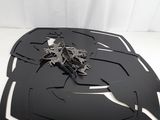 batman the dark knight logo cut out of a batman mask