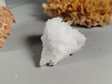 a small piece of rock next to a small piece of rock