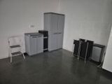 an image of a kitchen with a refrigerator and a refrigerator freezer
