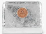the silver wallet has a leather label on it