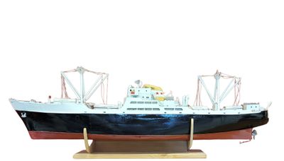 a model of a large boat on a wooden stand