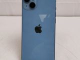 a close up of the back of a blue iphone 11