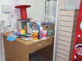 a desk with a red sign on it in a room