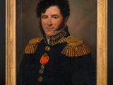 un tableau représentant un homme en uniforme militaire, dans un cadre doré