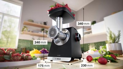 a picture of a meat grinder sitting on a kitchen counter