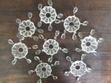 many pieces of glass on a wooden table