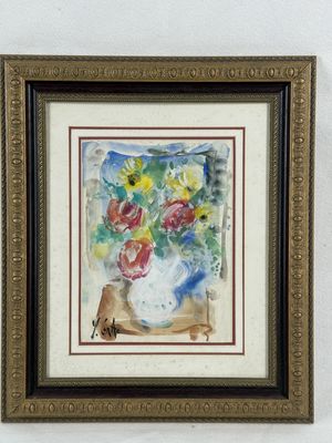 painting of a vase of flowers in a gold frame on a white wall