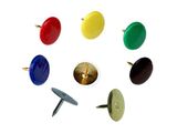many different colors of screws on a white surface