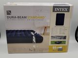 packaging of a box with a picture of a bed and a remote control