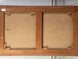 an old wooden frame with a cork board attached to it