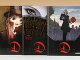 Les couvertures des trois livres de la série sur les vampires sont alignées