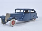 a toy car that is sitting on a white surface