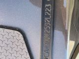 a close up of a car ' s emblem on the front of the car