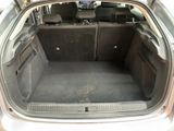 a trunk of a car with the back seats folded down