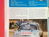 a magazine with a picture of a rally car on it