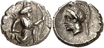 a silver coin with an image of a man on it