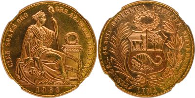 a close up of two gold coins on a white background