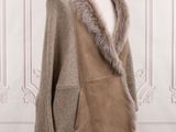an image of a mannequin mannequin with a fur collar