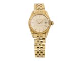 a lady ' s rolex watch with a gold bracelet