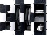 a black and white closet with clothes on it