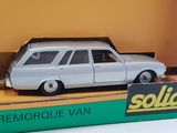 a toy car that is sitting on top of a box