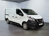 the white van is parked in a large room